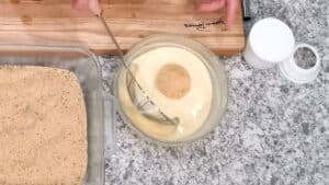 How to make Easy Arancini Recipe Dipping the Rice Balls in the egg mixture