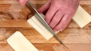 How To Make French Fries - cut them into strips