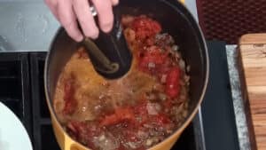 Beer Beef Stew Recipe - Add the drained tomatoes, Guinness beer