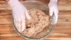 Chicken Meatballs- mix ground chicken mixture thoroughly