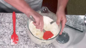Easy Tiramisu Recipe - Gently fold the mascarpone mixture into the whipped cream.