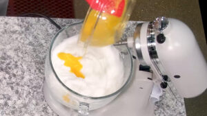 Easy Tiramisu Recipe - fold the egg yolk mixture into whipped egg whites.