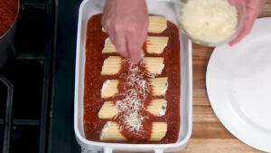 Manicotti Recipe - Sprinkle with shredded Mozzarella and Parmesan