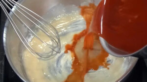 Easy Swedish Meatballs Recipe _Whisking Stock in to the Roux