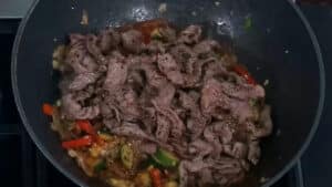 French Onion Beef Stir Fry add the beef back into the pan