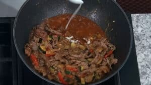 French Onion Beef Stir Fry - add the corn starch slurry to thicken the sauce